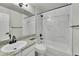 Modern bathroom features a bathtub, shower with tile surround, and granite countertops at 1795 Eldorado Cir, Superior, CO 80027