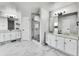 Beautiful bathroom features dual sinks, a glass shower, and modern fixtures at 1795 Eldorado Cir, Superior, CO 80027