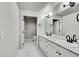 Bright bathroom boasts double sinks, modern finishes, and a separate toilet room at 1795 Eldorado Cir, Superior, CO 80027