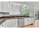 Kitchen showcasing stainless steel appliances, granite counters, hardwood floors and natural light at 1795 Eldorado Cir, Superior, CO 80027