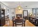 View of dining room with modern lighting, decorative art, and a fireplace at 621 Kearney St, Denver, CO 80220