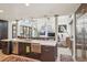 Bright, open kitchen with a large island, stainless appliances, and an open-concept layout at 621 Kearney St, Denver, CO 80220