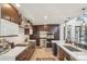 Modern kitchen featuring stainless steel appliances, sleek cabinetry, and designer backsplash at 621 Kearney St, Denver, CO 80220