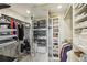 Organized walk-in closet with shelves, hanging rods, and ample storage space at 621 Kearney St, Denver, CO 80220