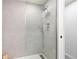 Clean shower stall with glass enclosure and modern fixtures at 4700 S Decatur St, Englewood, CO 80110