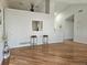 Spacious living room featuring hardwood floors, light-colored walls, and an open layout perfect for entertaining at 808 Idalia St, Aurora, CO 80011