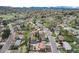 Residential neighborhood featuring mature trees, well-maintained lawns and mountain views in the distance at 11398 W Ford Pl, Lakewood, CO 80226