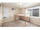 Bedroom featuring a wood bunk bed frame with carpet floors and natural light at 11398 W Ford Pl, Lakewood, CO 80226