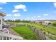 A backyard featuring a well-maintained lawn, outdoor grill and neighborhood views at 15604 Xenia Way, Brighton, CO 80602