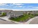 Charming home showcasing beautiful landscaping, a well-manicured lawn, and a welcoming facade at 15604 Xenia Way, Brighton, CO 80602