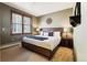 Spacious bedroom with a king-size bed and large window at 680 S Main St # 19, Breckenridge, CO 80424