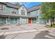 View of townhomes with attached garages and parking at 680 S Main St # 19, Breckenridge, CO 80424