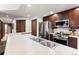 Modern kitchen with stainless steel appliances and light countertops at 680 S Main St # 19, Breckenridge, CO 80424