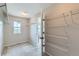 Walk-in closet features carpet, white wire shelving, and a window at 5975 Hanover St, Denver, CO 80238