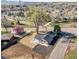 Aerial view of the home surrounded by a large, landscaped yard with mature trees at 16130 Mt Vernon Rd, Golden, CO 80401
