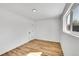 Spacious bedroom with wood floors and natural light at 16130 Mt Vernon Rd, Golden, CO 80401