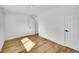 Bright bedroom with wood floors and modern fixtures at 16130 Mt Vernon Rd, Golden, CO 80401