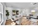 Bright dining room features a wooden table set and view to outside at 16130 Mt Vernon Rd, Golden, CO 80401