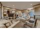 Elegant living room with a cozy fireplace, neutral tones, and ample seating arrangement at 2988 Rockbridge Dr, Highlands Ranch, CO 80129