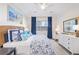 Bright bedroom with a king-size bed and ample natural light at 11261 W Quincy Pl, Littleton, CO 80127