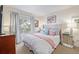 Bright bedroom with a comfortable bed and window at 11261 W Quincy Pl, Littleton, CO 80127