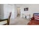 Bedroom with access to the upper hallway and a sitting area at 11261 W Quincy Pl, Littleton, CO 80127
