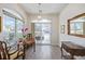 Charming breakfast nook with a round table and access to a backyard patio at 11261 W Quincy Pl, Littleton, CO 80127