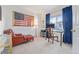 Home office with a comfortable chair and a work desk at 11261 W Quincy Pl, Littleton, CO 80127