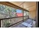 The balcony overlooks trees and other buildings at 14780 E Kentucky Dr # 432, Aurora, CO 80012