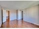 Open bedroom with hardwood flooring and multiple closets for storage at 14780 E Kentucky Dr # 432, Aurora, CO 80012
