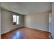 Sunny bedroom featuring hardwood flooring, and natural light at 14780 E Kentucky Dr # 432, Aurora, CO 80012