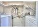This laundry room comes equipped with a washer, dryer, and utility sink at 14780 E Kentucky Dr # 432, Aurora, CO 80012