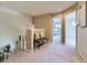 Open hallway area featuring neutral carpeting, decorative bench, and clear views of adjacent rooms at 10904 Eagle Run Dr, Parker, CO 80138