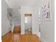 Small bathroom with shower/tub combo, toilet and hardwood floors at 2740 N Fillmore St, Denver, CO 80205