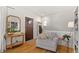 Entryway with hardwood floors, coat rack, and comfortable seating at 2740 N Fillmore St, Denver, CO 80205