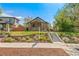 Brick home with landscaped terrace steps and a charming gable roof at 2740 N Fillmore St, Denver, CO 80205