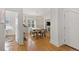 Bright hallway with hardwood floors and access to other rooms at 2740 N Fillmore St, Denver, CO 80205