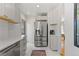 Modern kitchen with stainless steel appliances and white cabinets at 2740 N Fillmore St, Denver, CO 80205