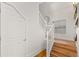 Clean and bright staircase leading to the upper level at 2740 N Fillmore St, Denver, CO 80205