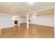 Large basement space with recessed lighting, offering potential for customization and various uses at 5582 E Colorado Ave, Denver, CO 80222