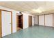 Finished basement with closets and storage, and updated flooring, creating a functional space at 5582 E Colorado Ave, Denver, CO 80222