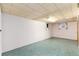 Finished basement with updated flooring and lighting creating a comfortable and functional space at 5582 E Colorado Ave, Denver, CO 80222