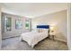Bedroom with carpet and two windows for natural light at 1310 S Monaco Pkwy # 23, Denver, CO 80224