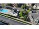 This aerial view showcases the neighborhood pool, playground, and outdoor facilities at 23560 Alamo Pl # B, Aurora, CO 80016