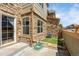 Inviting backyard with stone exterior and well-maintained lawn with patio, perfect for entertaining or relaxing outdoors at 23560 Alamo Pl # B, Aurora, CO 80016