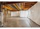 Unfinished basement with painted concrete floors, exposed ductwork and a concrete foundation ready to be personalized at 23560 Alamo Pl # B, Aurora, CO 80016