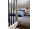 Cozy bedroom featuring a comfortable bed and a classic nightstand with a lamp at 21221 Colorado 103, Idaho Springs, CO 80452