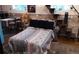 Comfortable bedroom with a futon, desk, and unique design elements at 21221 Colorado 103, Idaho Springs, CO 80452