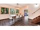 Dining room with bright windows and wood floors at 21221 Colorado 103, Idaho Springs, CO 80452