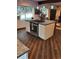 Lovely kitchen showcasing an island with cooktop and white cabinetry at 21221 Colorado 103, Idaho Springs, CO 80452